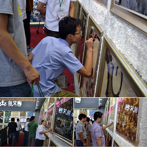 现场客商仔细观摩永利中国2.0道厚系列爆晶微晶石